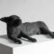 José Cobo. Perro tumbado. Escultura bronce. 43x29x17 cm